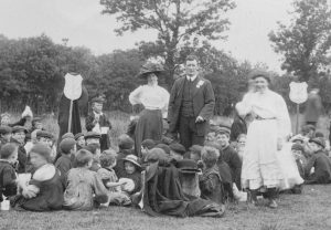 Group scene of carers and children at Childhaven